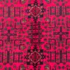 Close-up of stepped diamond guls, geometric floral branches, and fine hand-knotted wool pile on a vibrant red Afghan Torkman rug.
