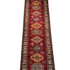Full overhead view of a 2' 6" x 10' 0" hand-knotted Afghan Kazak wool runner rug featuring a vertical row of geometric tribal medallions in blue, gold, and ivory on a vibrant red field.