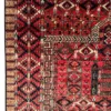 Detailed corner view of an Afghan Torkman wool rug showing multi-band geometric borders and fringe edge.