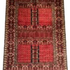 Full overhead view of a 7' 0" x 10' 0" hand-knotted Afghan Torkman wool rug with prayer niche arch motifs, columnar cartouches, and geometric diamond borders on a rich crimson red field.