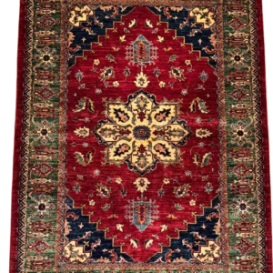 Full overhead view of a 6' 0" x 8' 0" hand-knotted Afghan Kazak wool rug featuring an ornate gold floral medallion, deep navy stepped spandrels, and a moss-green tribal border on a rich crimson red field.